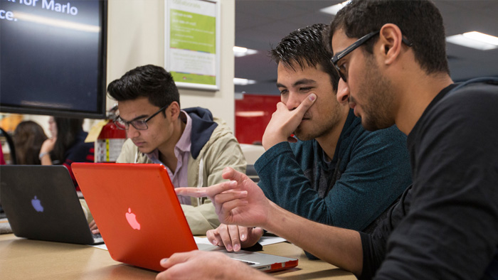 students interacting at a learning workshop